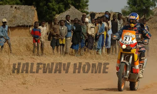 spain's red bull repsol entry of marc coma slows for villages